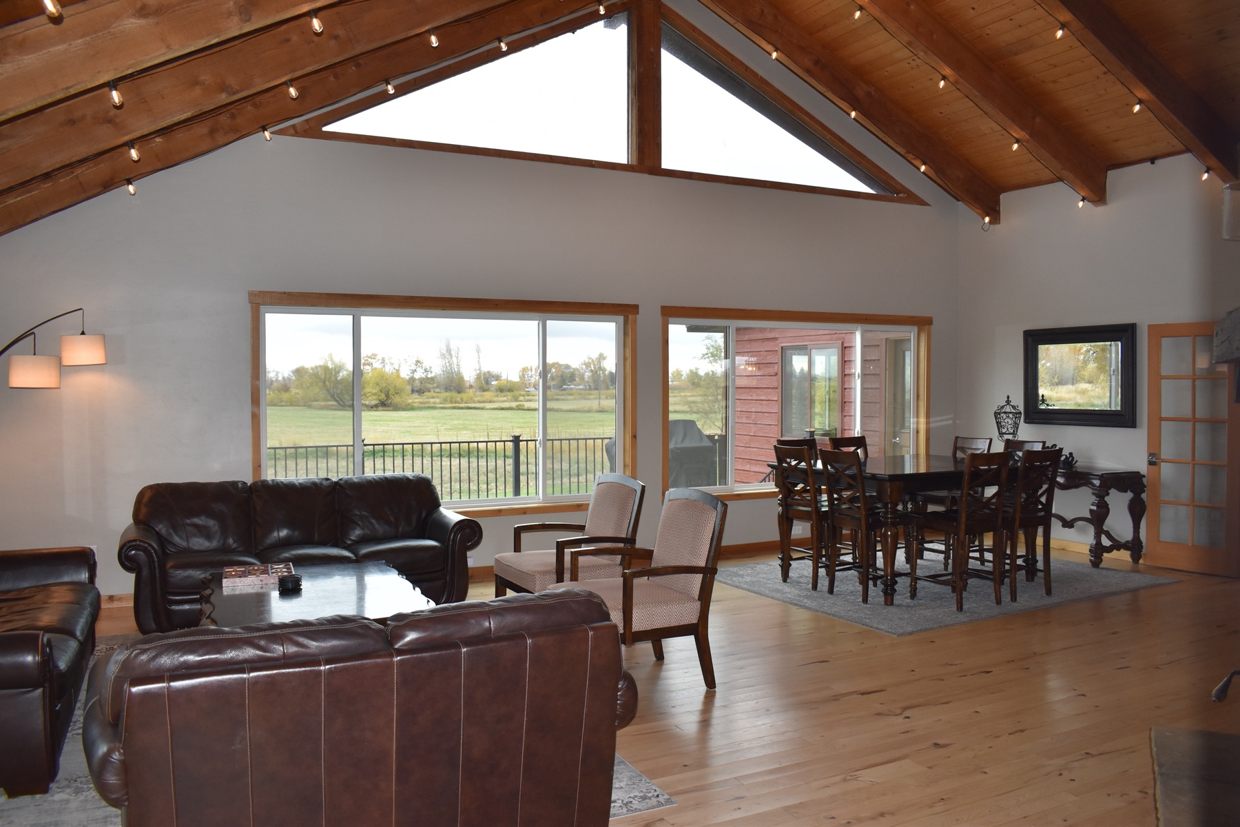 Lodge great room with living, dining, and kitchen under one roof