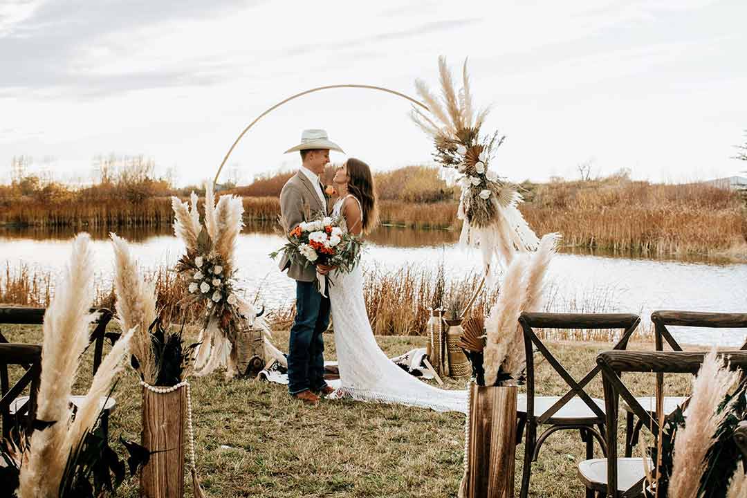 Circular ceremony arch by the pond