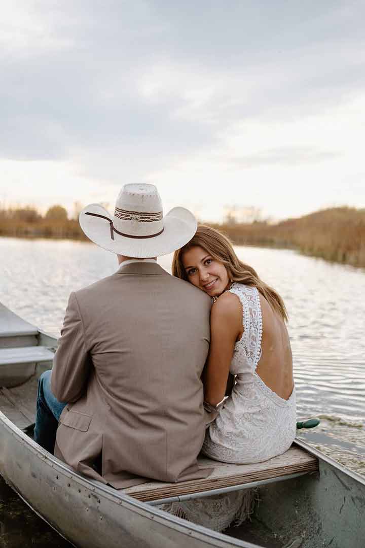 Bride and groom in a rowboat